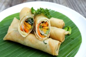 Lumpia or lunpia, is a traditional spring roll skin snack from Semarang, Indonesia. Traditional Spring rolls made of eggs, and flour. Inside the Lumpia there are vegetables.